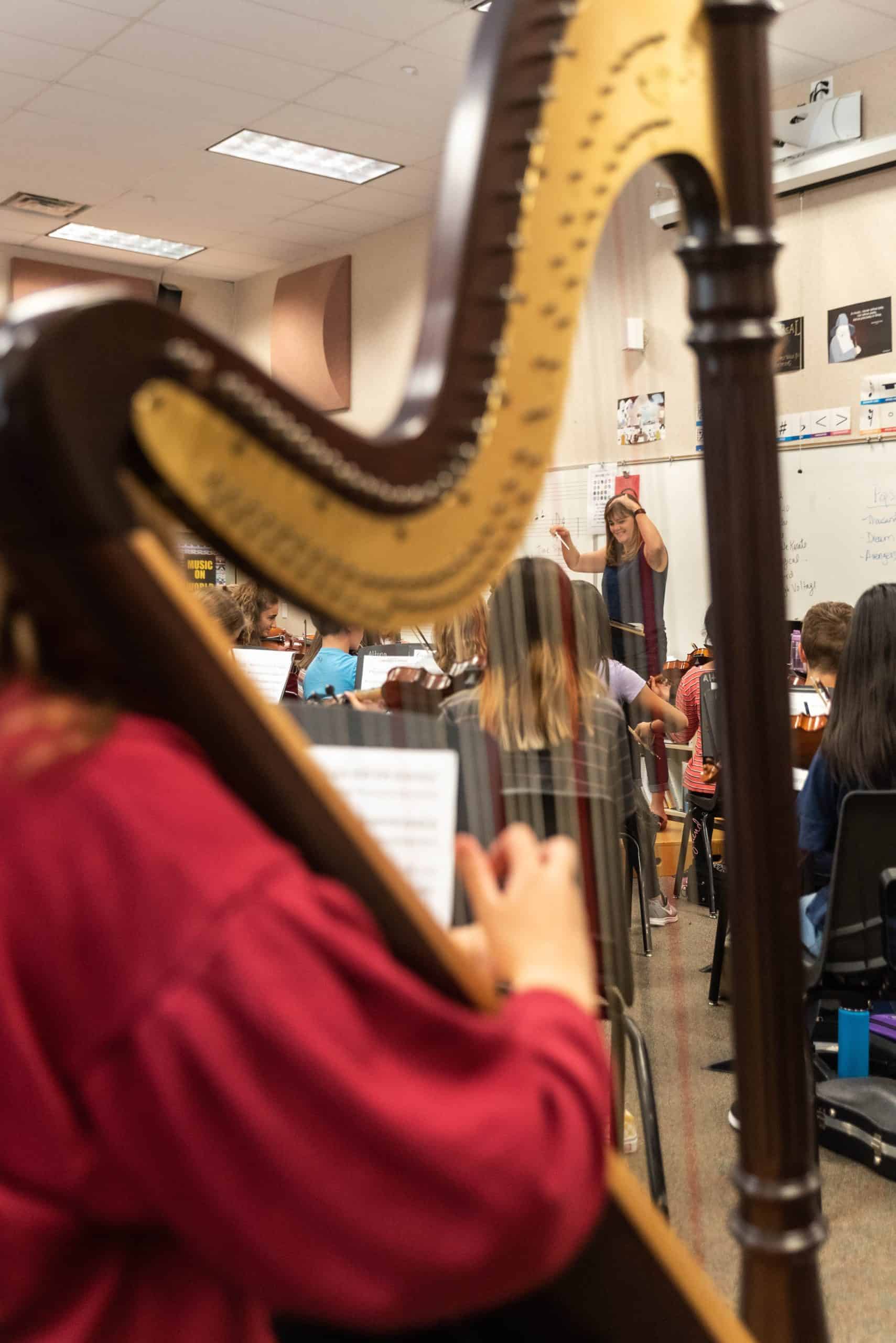 harp played by student during music class